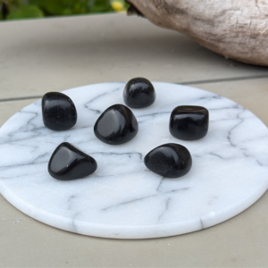 sort obsidian lommesten