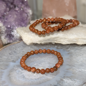 armbånd i guldsten